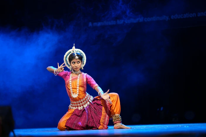 Young artist performing classical dance